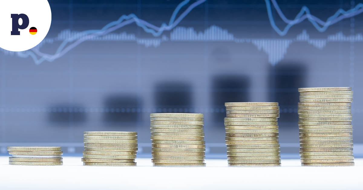 monety i wykres giełdowy